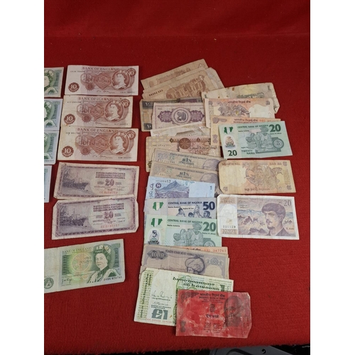 118 - Collection of various banknotes incuding COIN serial number Ten Shilling note