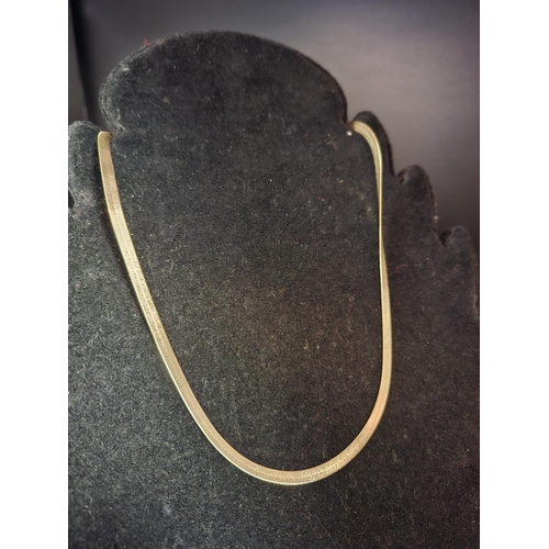 61 - 14ct flat gold necklace length 43cm 7grams