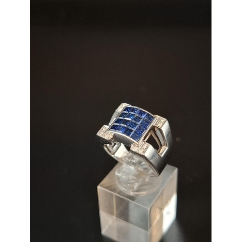 82 - stunning 18ct white gold sapphire and diamond ring. 16 sapphires and 12 diamonds Size N weight 12.6 ... 