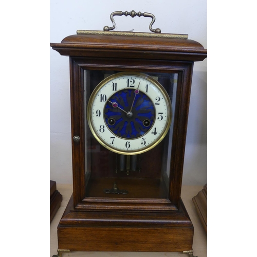 644 - Upright Mantel Clock, Brass Carrying Handle above a Circular Dial, Arabic Chapter Ring, Glass Front ... 