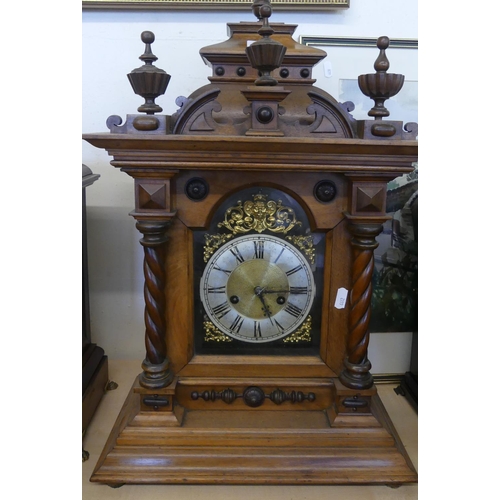 651 - Late Victorian Carved Oak Mantel Clock The Architectural Top with Turned Finials, Brass Face with Si... 