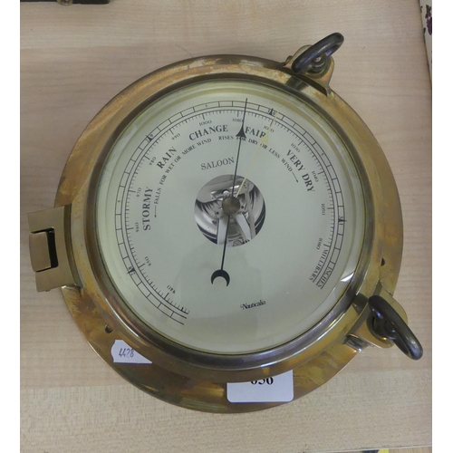 656 - Brass Nauticalia Saloon Port Hole Barometer.