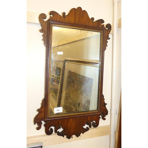 586 - Antique Figured Mahogany Fret-Cut Wall Mirror, measuring 65cm tall.