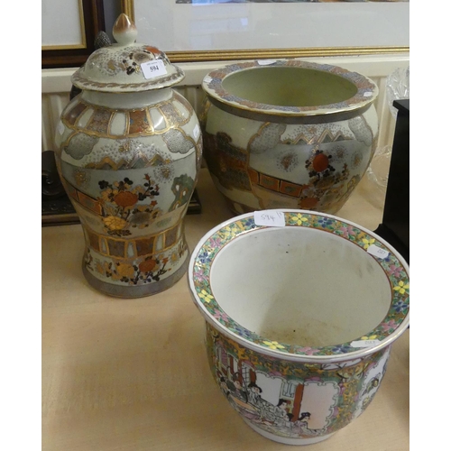 594 - Two Oriental Planters and a Jar & Cover.