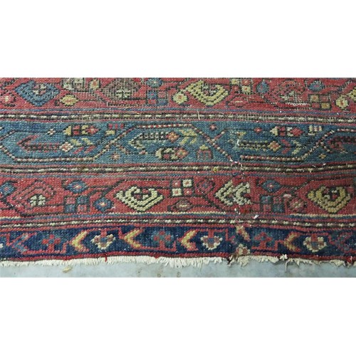 1669 - Large Antique Fringed & Bordered Wool Rug, measuring 180 x 324cm.