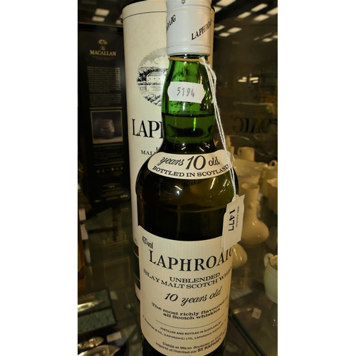 1477 - Bottle of 10 Year Old Laphroaig Unblended Islay Malt Scotch Whisky.