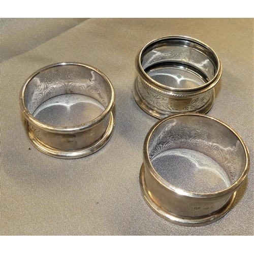 1579 - Three Odd Silver Napkin Rings, weighing approx 1.6 oz troy.