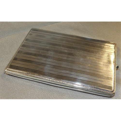 1584 - Britannia 925 Silver Engine Turned Cigarette Case with Blue Cabochon Closure, weighing approx 3.7 oz... 