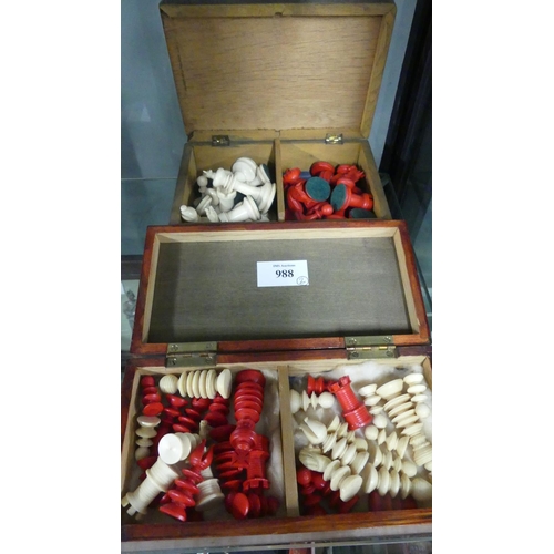 988 - Two Boxes of Stained Bone Chess Pieces.