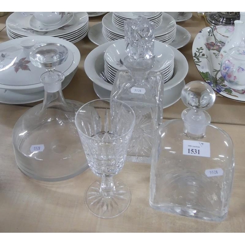 1531 - Three Glass Decanters and a Wine Glass.