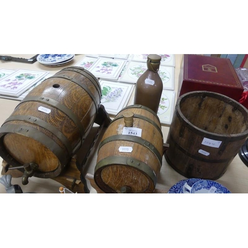 1543 - Two Oak Sherry Barrels with Brass fittings on Stands, Metal Bound Wooden Pail and Copper Bottle.