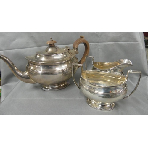 1557 - London Silver Three Piece Tea Service, maker E & S, weighing approx 34.06oz troy (overall weight inc... 