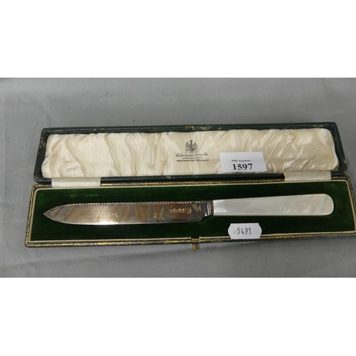 1597 - Cased Sheffield Silver Bread Knife with MOP Handle.