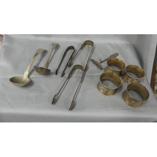 1610 - Silver Tongs, Silver Serving Fork, Four Continental Silver Napkin Rings & Two Plated Toddy Ladles.