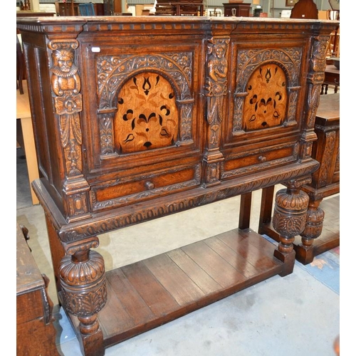 2890 - Carved Oak Inlaid Cupboard - Width 130cm x depth 48cm & Height 137cm.