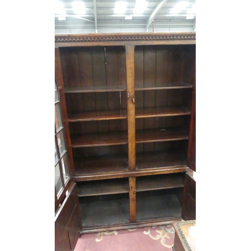 2888 - Carved Oak Glass Front Bookcase - approx Width 120cm x Depth 37cm & Height 183cm.