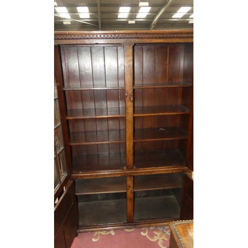 2888 - Carved Oak Glass Front Bookcase - approx Width 120cm x Depth 37cm & Height 183cm.