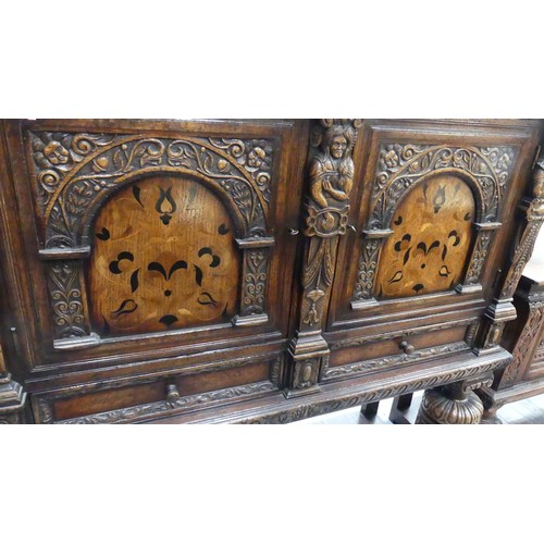 2890 - Carved Oak Inlaid Cupboard - Width 130cm x depth 48cm & Height 137cm.