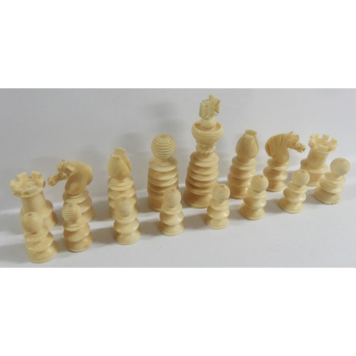 988 - Two Boxes of Stained Bone Chess Pieces.