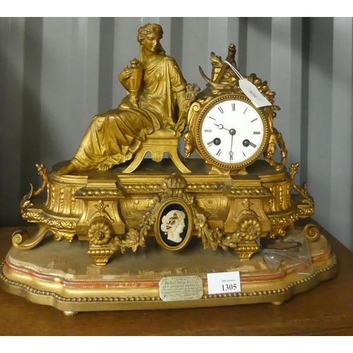 1305 - French Style Gilt Metal Figural Mantel Clock on Stand.