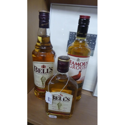 849 - Bottle of Famous Grouse Whisky, Bells Whisky & Half Bottle of Bells Whisky.