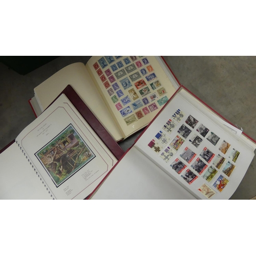 891 - Three Stamp Albums.