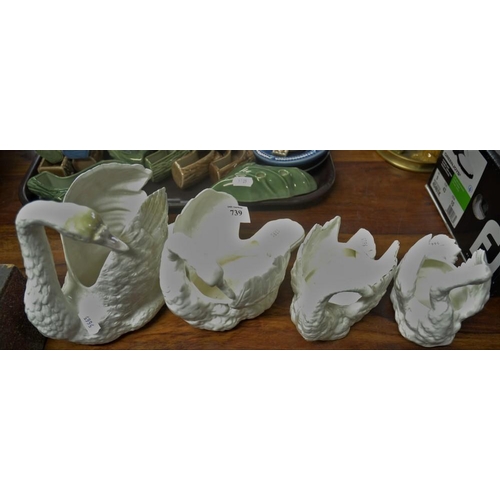 739 - 4 Ceramic Graduated Swans.