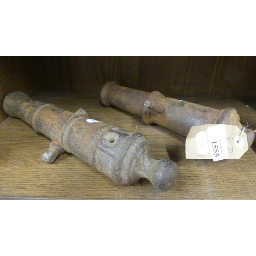 1555 - Two Small Cast Iron Cannon Barrels, approx 29cm & 26cm long.