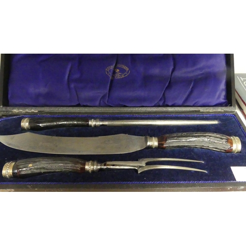 835 - Cased Antler Handled Carving Set.