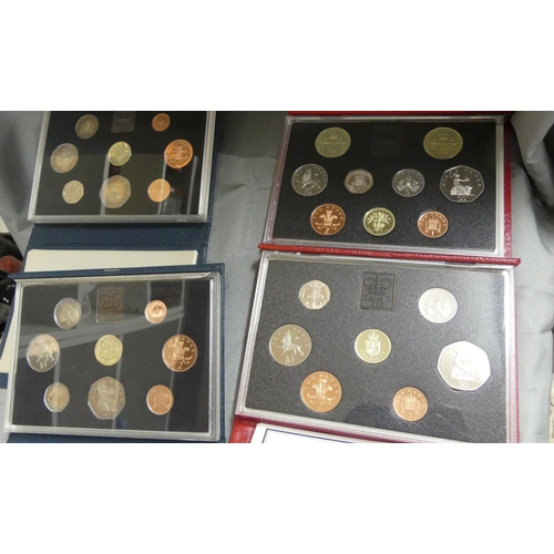 867 - Four Cased Royal Mint Proof Coin Sets - 1p - £1.00, dating 1984, 1985, 1988 & 1989.