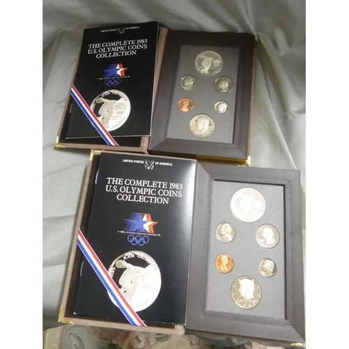 872 - 2 x The Complete 1983 US Olympic Coin Collection.