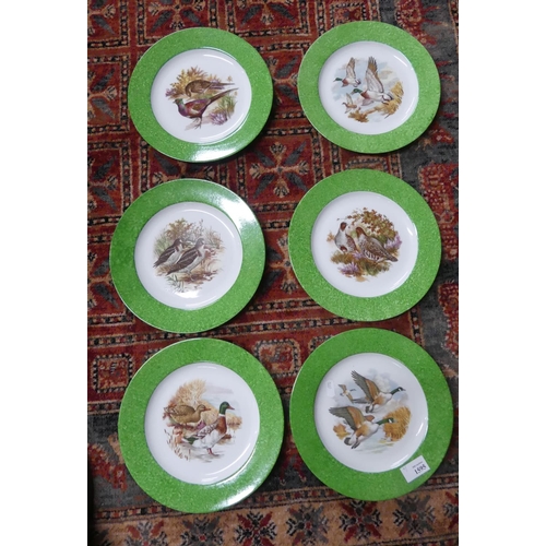 1595 - Six Limoges Porcelain Plates with Gamebird & Wildfowl Decoration within green borders, approx 24 1/2... 