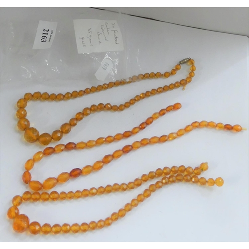 2163 - Amber Coloured Faceted Beads.