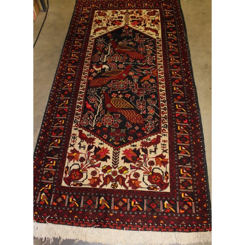 2194 - Persian Design Eastern Fringed & Bordered Wool Rug, approx 89 x 180cm.