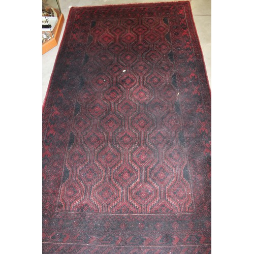 2196 - Deep Red Eastern Wool Rug, approx 130 x 288cm.