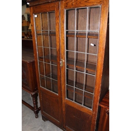 3247 - Oak Bookcase With Leaded Glass Doors.