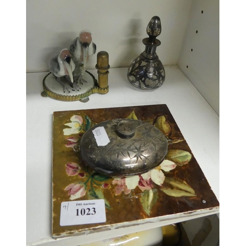 1023 - Victorian Handpainted Tile, Continental Porcelain Figure, Scent Bottle with Silver Mounts etc.