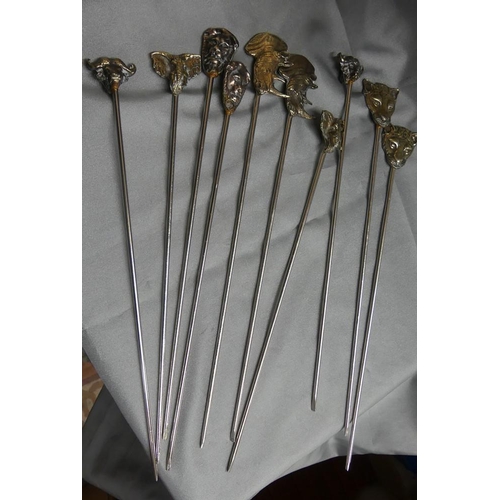 1034 - Set of 10 Animal Head Meat Skewers.