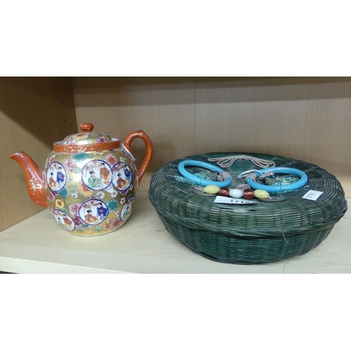 1118 - Oriental Porcelain Teapot & Basket.