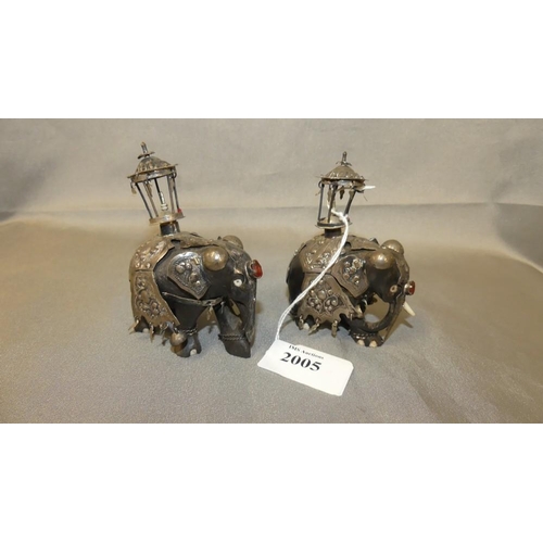 2005 - Pair of Small White Metal Mounted Carved Ebony Elephants.