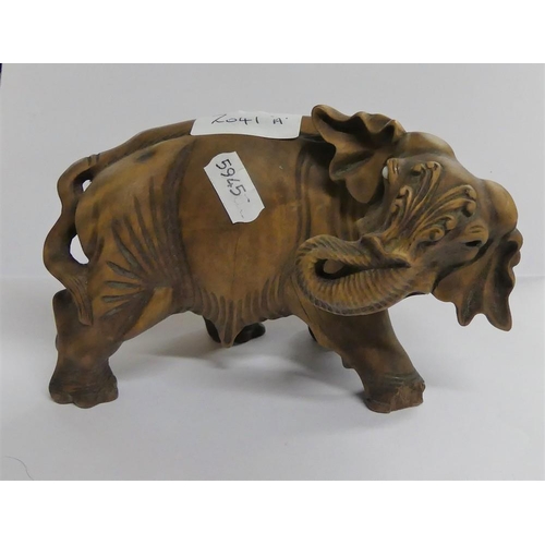 2041A - Carved Wood Elephant, approx 17cm across.