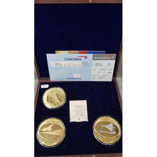 2078 - Three Oversized Concorde 1969-2003 Gold Plated Coins.