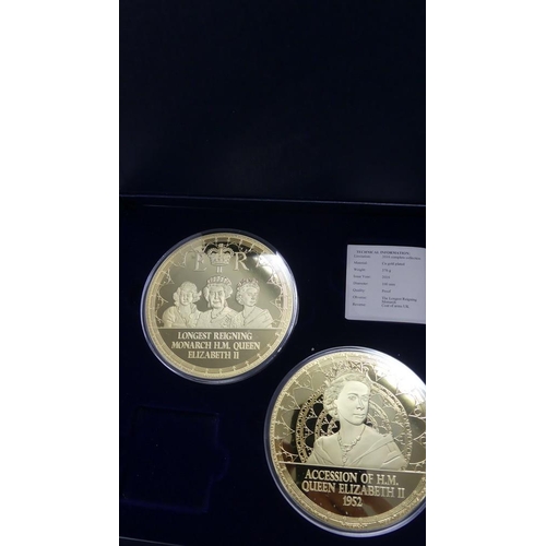 2108 - Case of Two Oversized Gold Plated Collectors Coins.