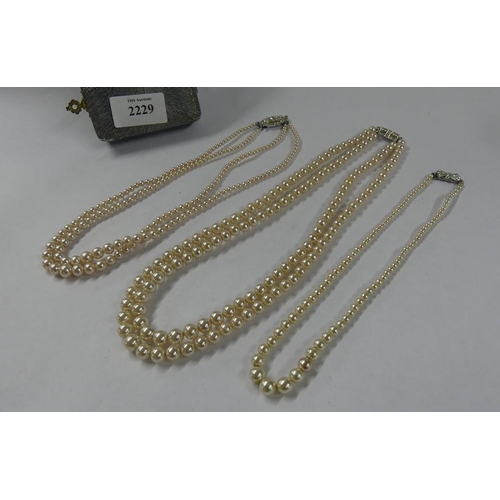 2229 - Three Strands of Faux Pearls.