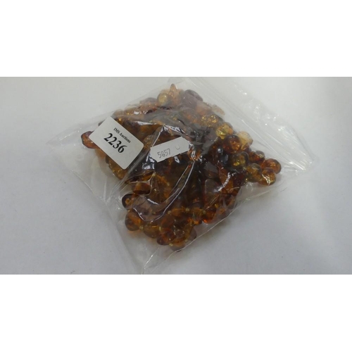 2236 - Bag of Amber Coloured Beads.