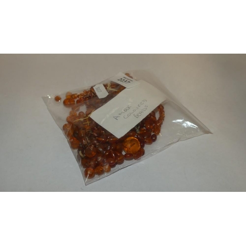 2237 - Bag of Amber Coloured Beads.