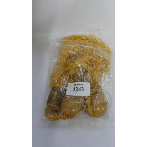 2243 - Bag of Amber Mounted Tassles.