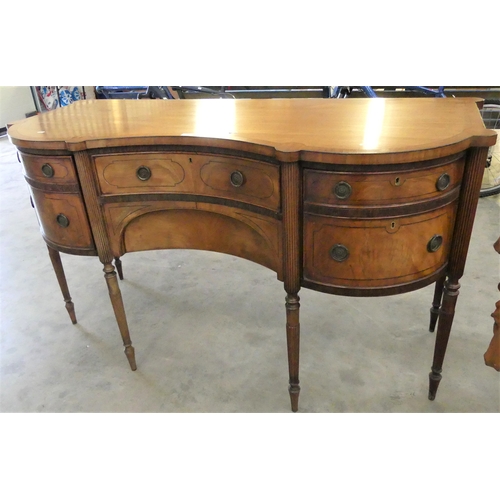 3437A - Antique Mahogany Serpentine Front Sideboard, supported on Reeded Legs.