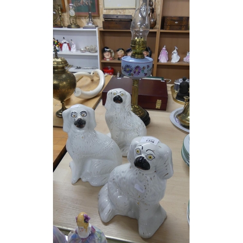 1358 - Three Staffordshire Mantel Dogs.