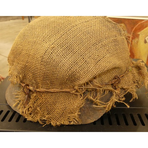 1260 - German WWII Helmet - Hessian Sacking Camouflage held in-place with a strand of barbed wire.